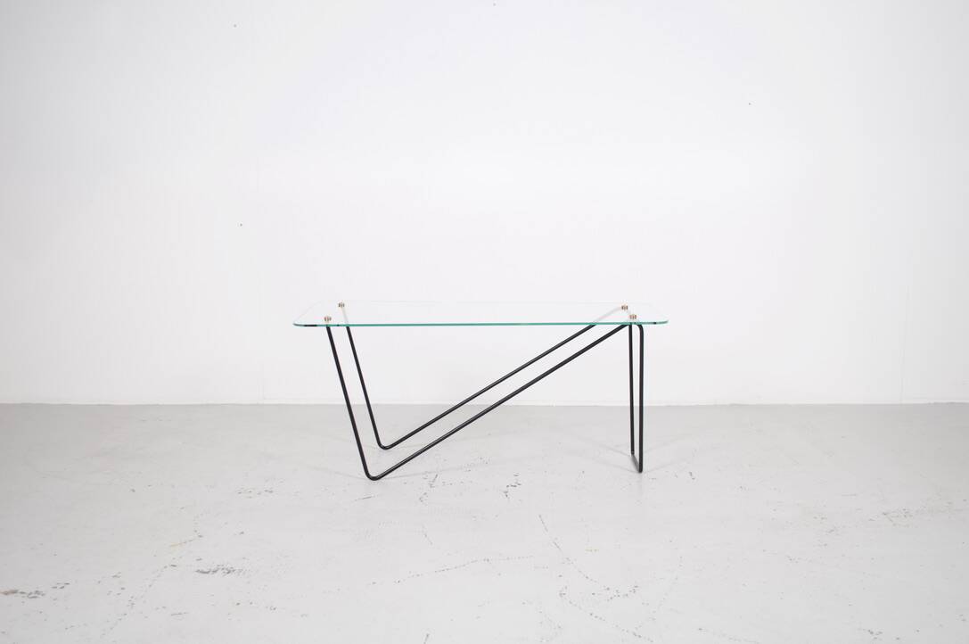 1950's glass and steel coffee table free form