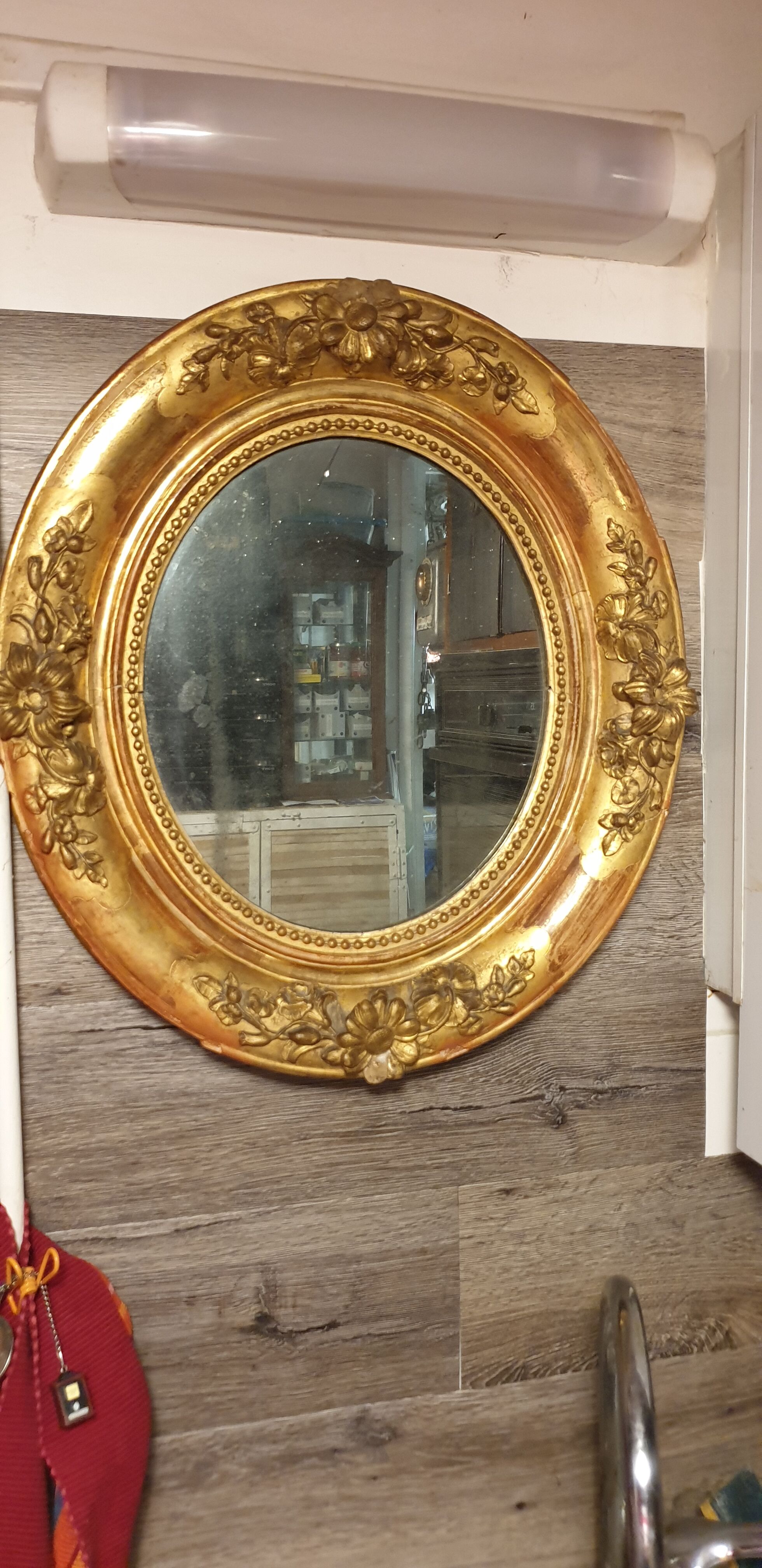 Oval mirror XIXth 43x56cm