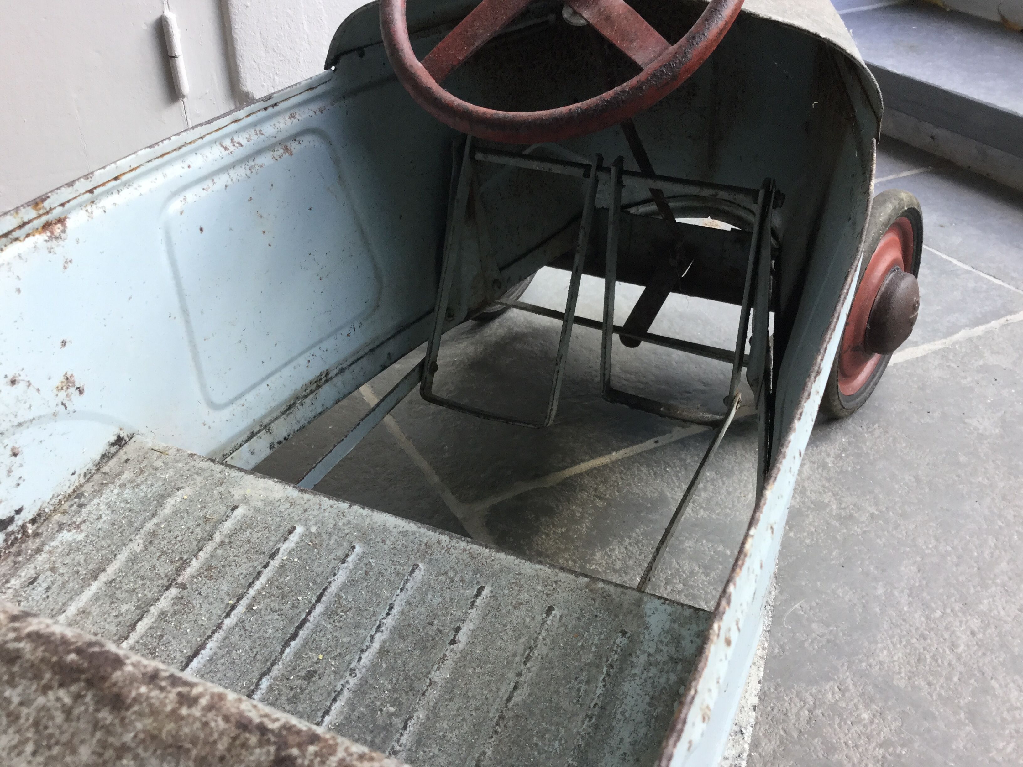Old metal pedal car 1930