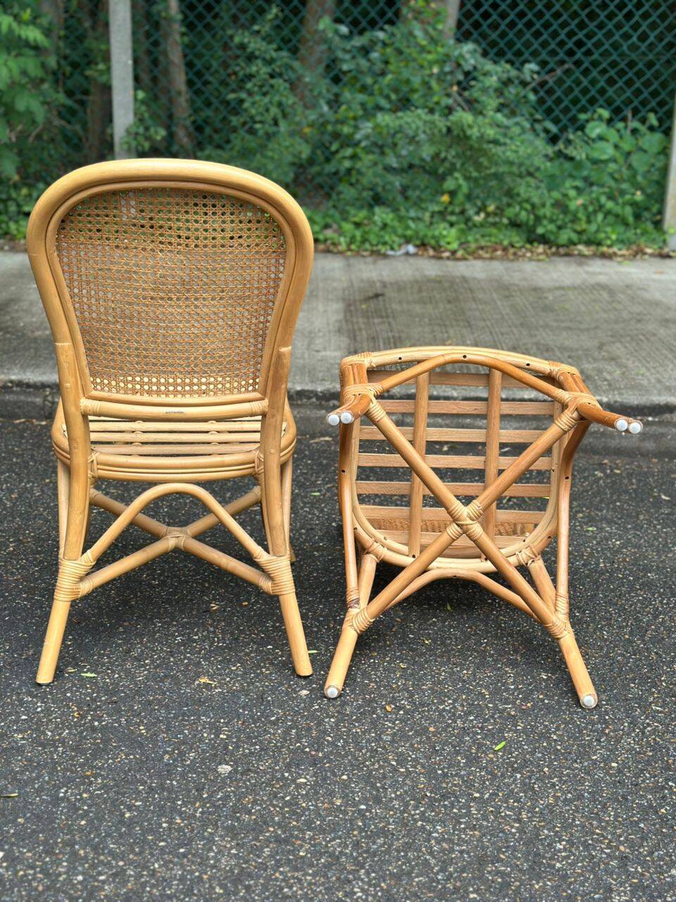 2 rattan and caned chairs in colonial bistro style from the 1990s.
