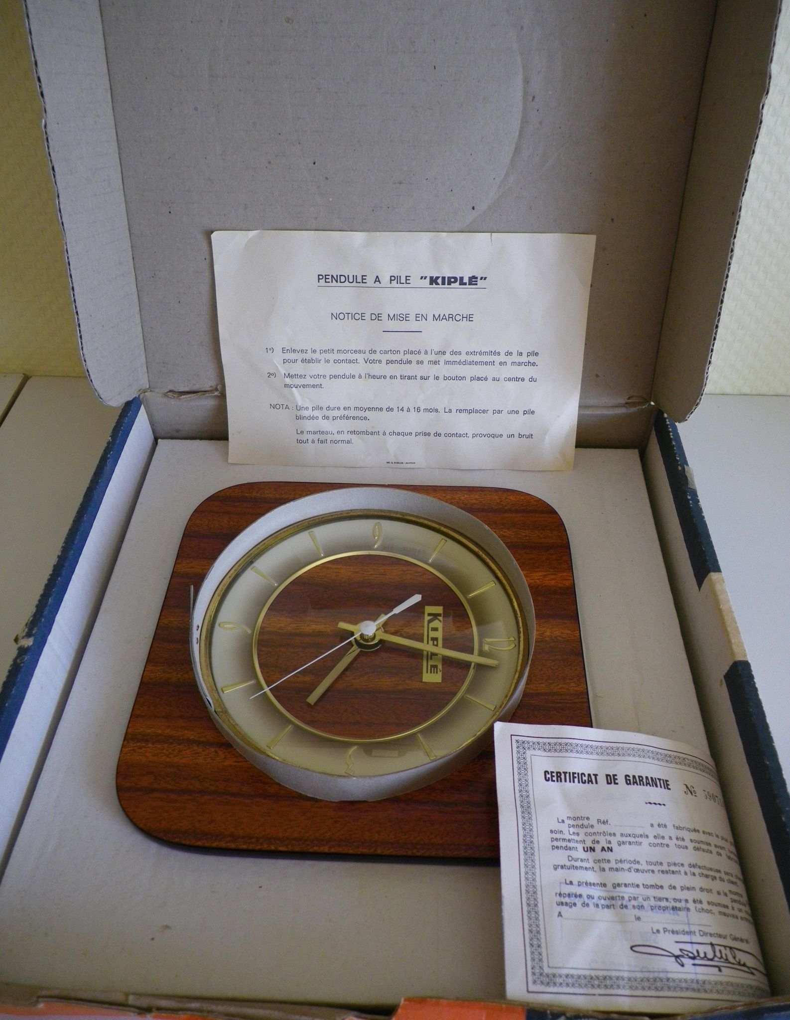 Clock in mahogany formica, metal, wood, glass, in its original box - Brand KIPLE - 70s