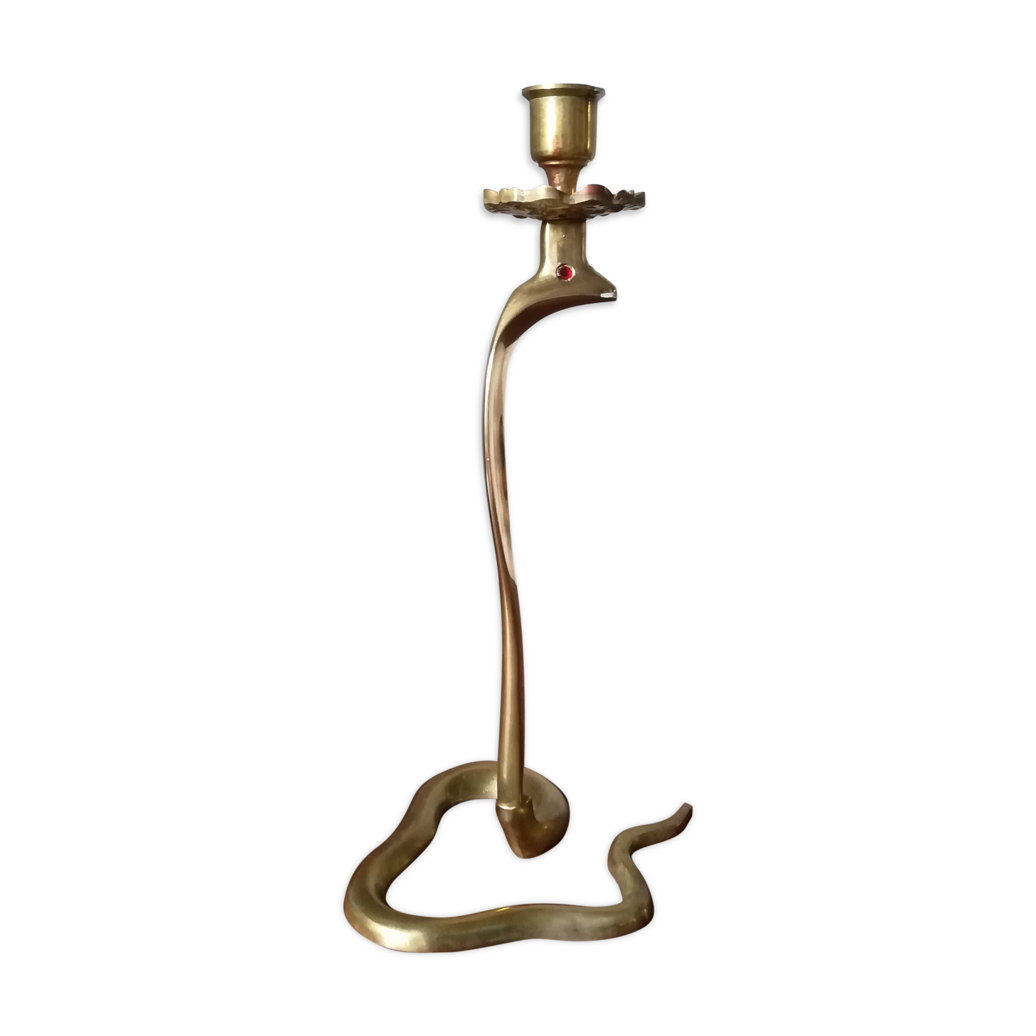 Candlestick mounted on brass cobra