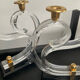Pair of Hollywood Regency candlesticks in lucite and brass