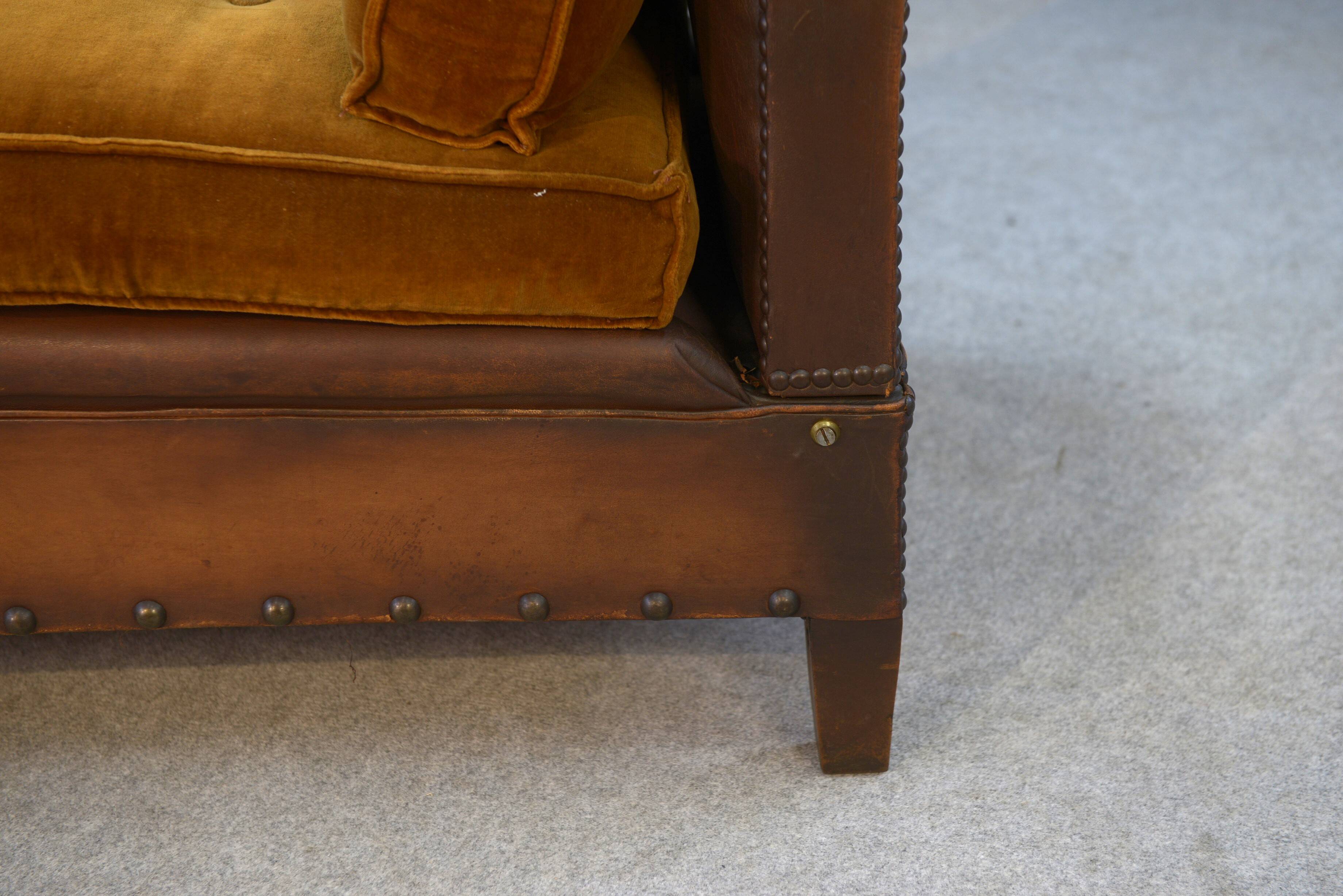 Studded leather bench circa 1920