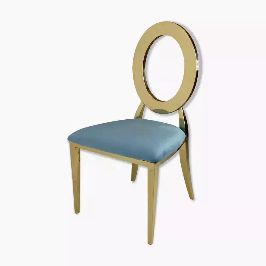 Gold chair with turquoise velvet seat