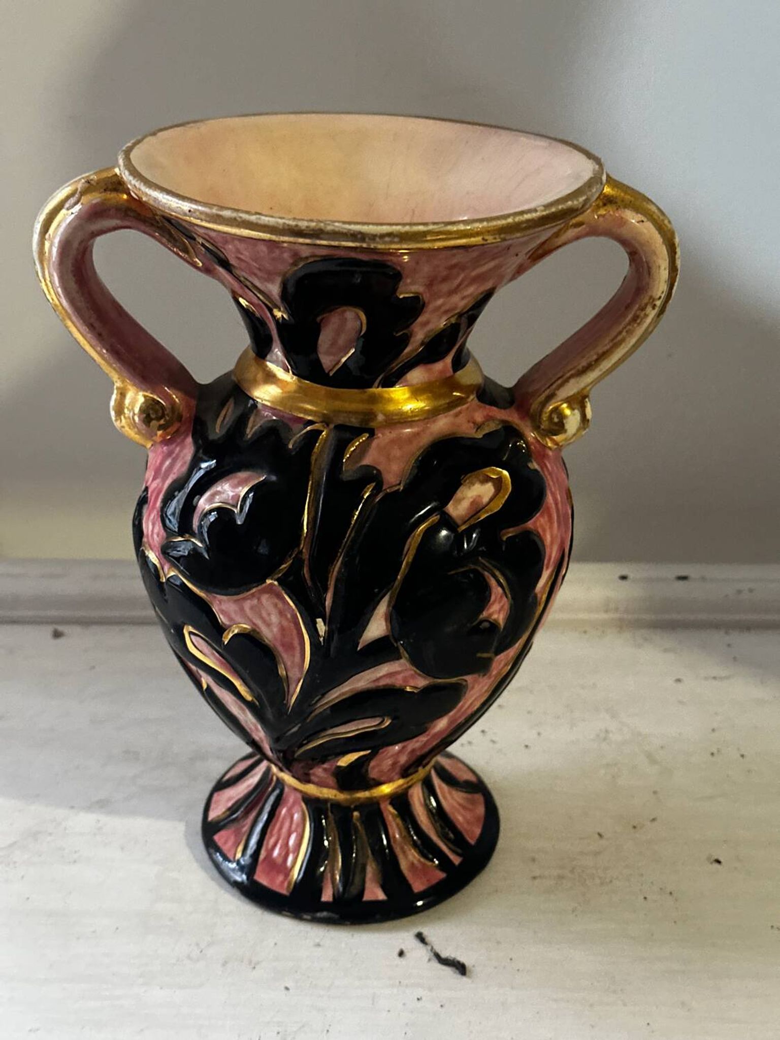 Vintage Vallauris vase amphora with relief floral decoration.