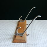 Double metal hook on wooden base