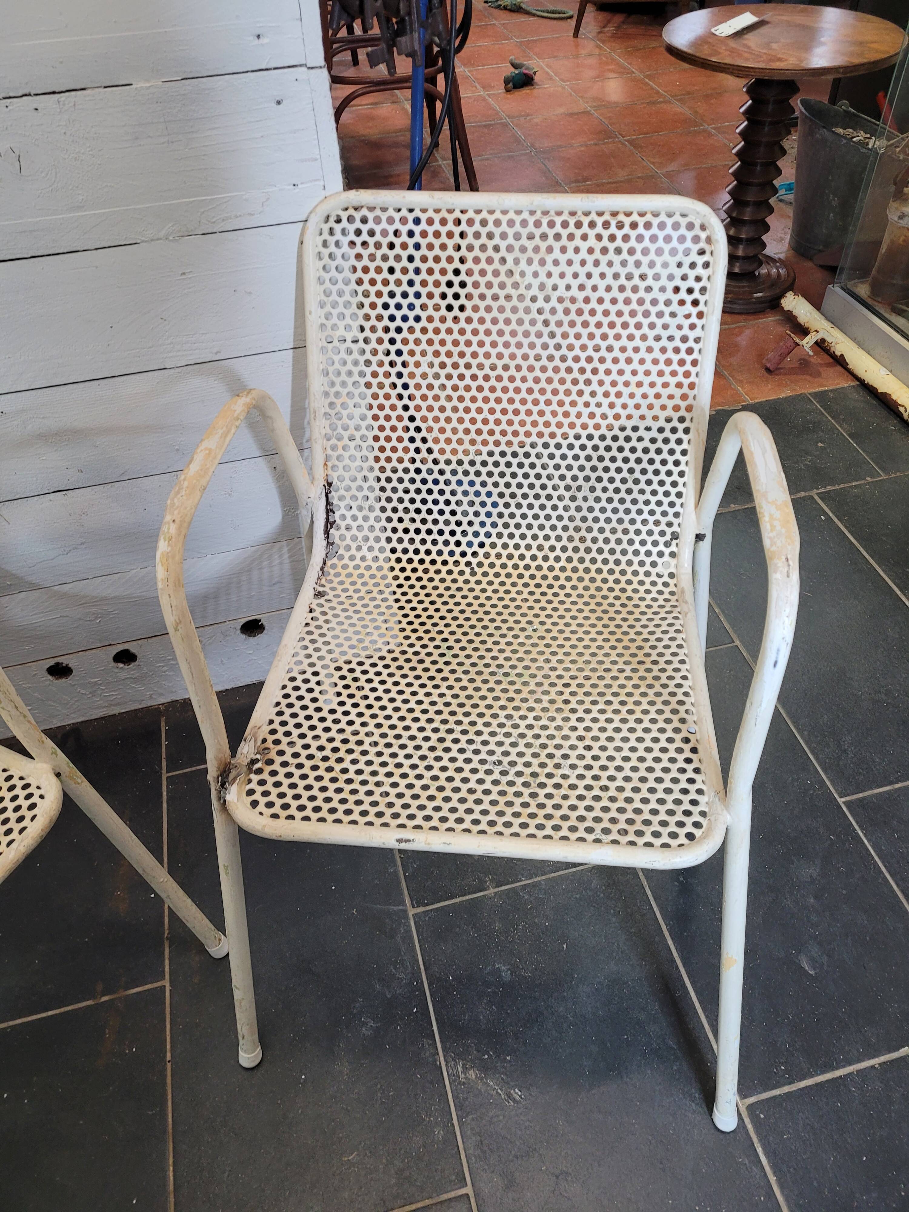 4 perforated metal garden armchairs
