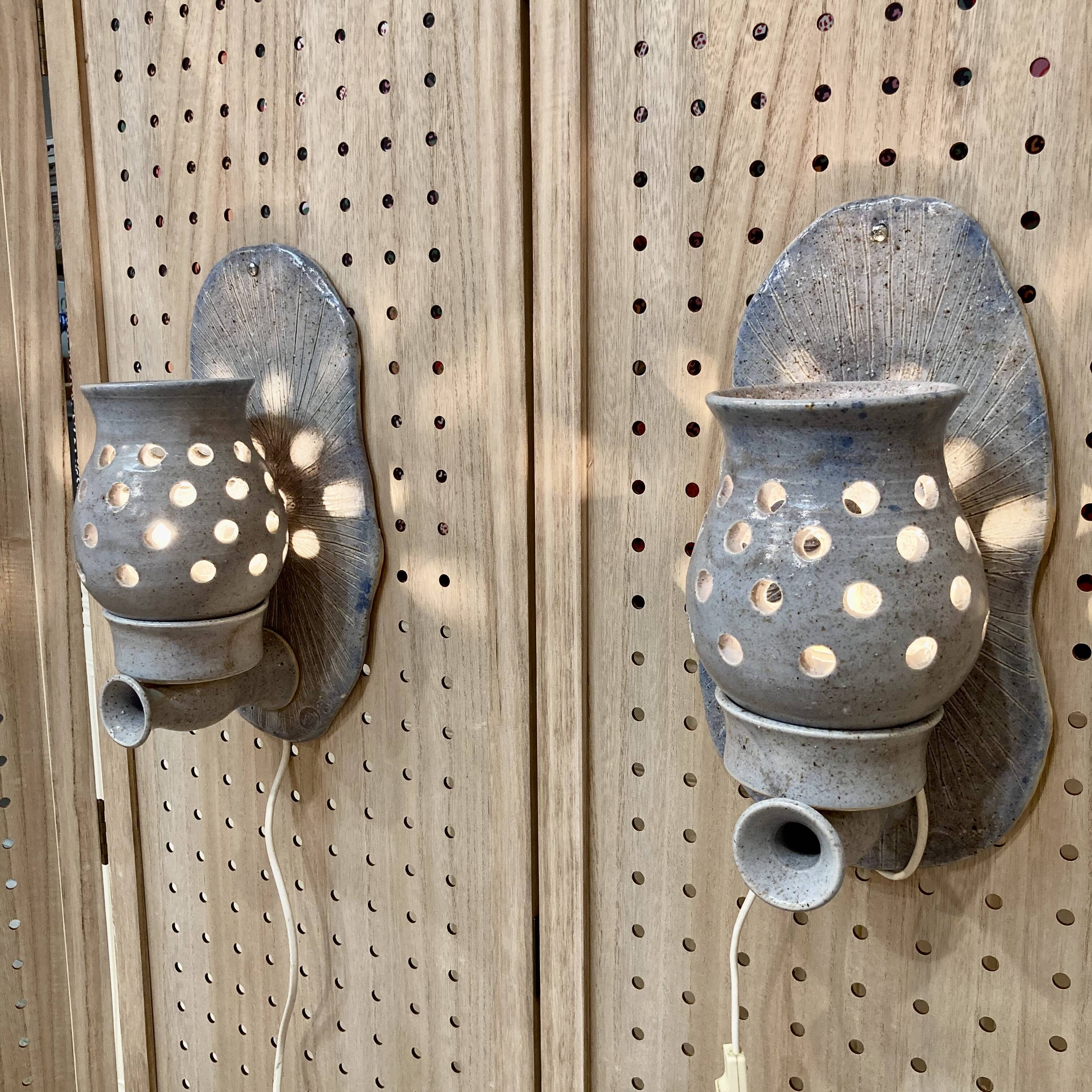 Pair of enamelled terracotta wall lights 1960.