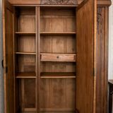 Old solid wood wardrobe with three vintage mirror doors