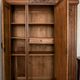 Old solid wood wardrobe with three vintage mirror doors