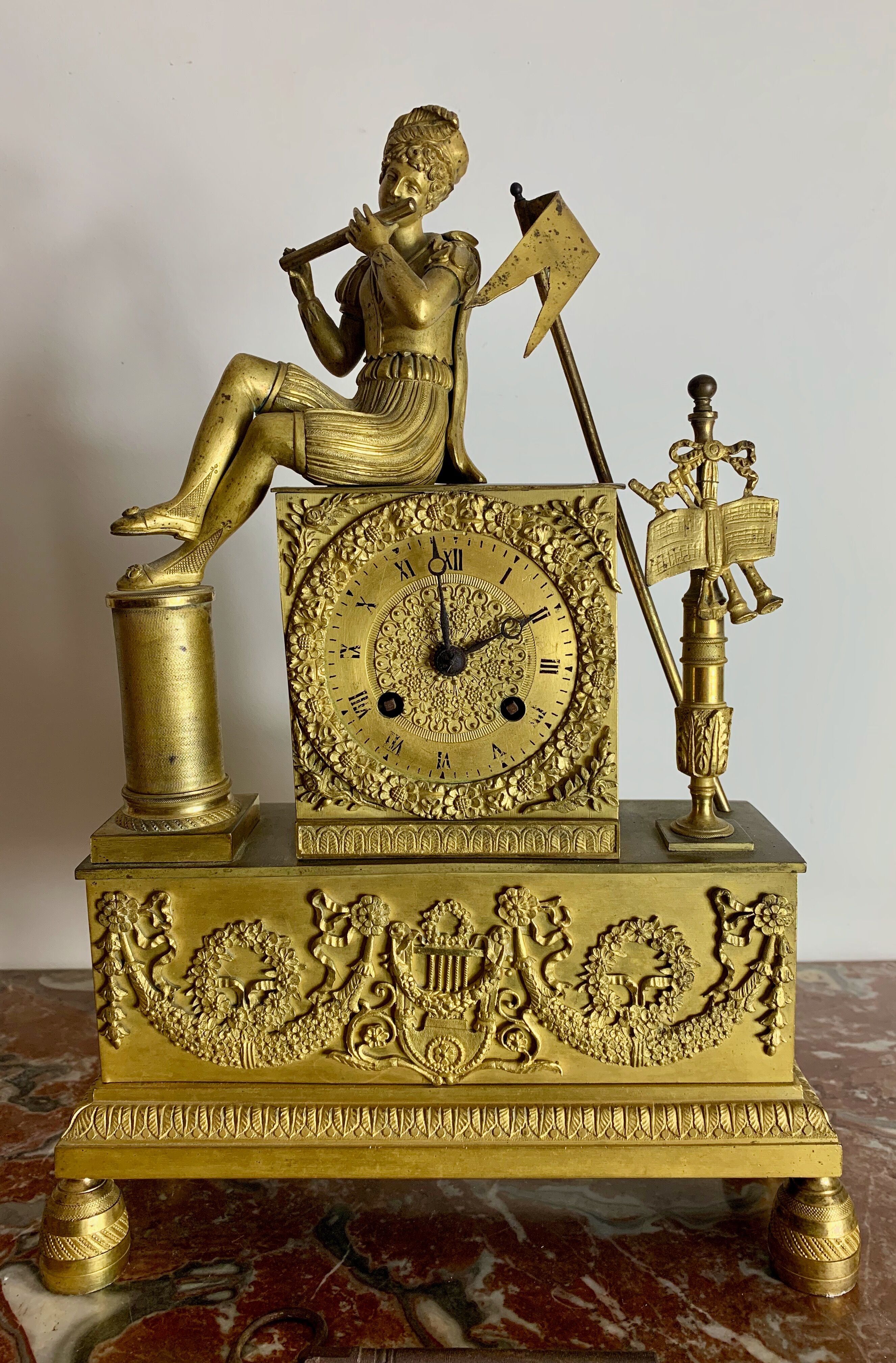 Period clock restoration in gilded bronze