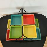 Black metal appetizer set with colorful ceramic ramekins