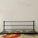 Vintage wall-mounted coat rack in steel, brass and ceramic