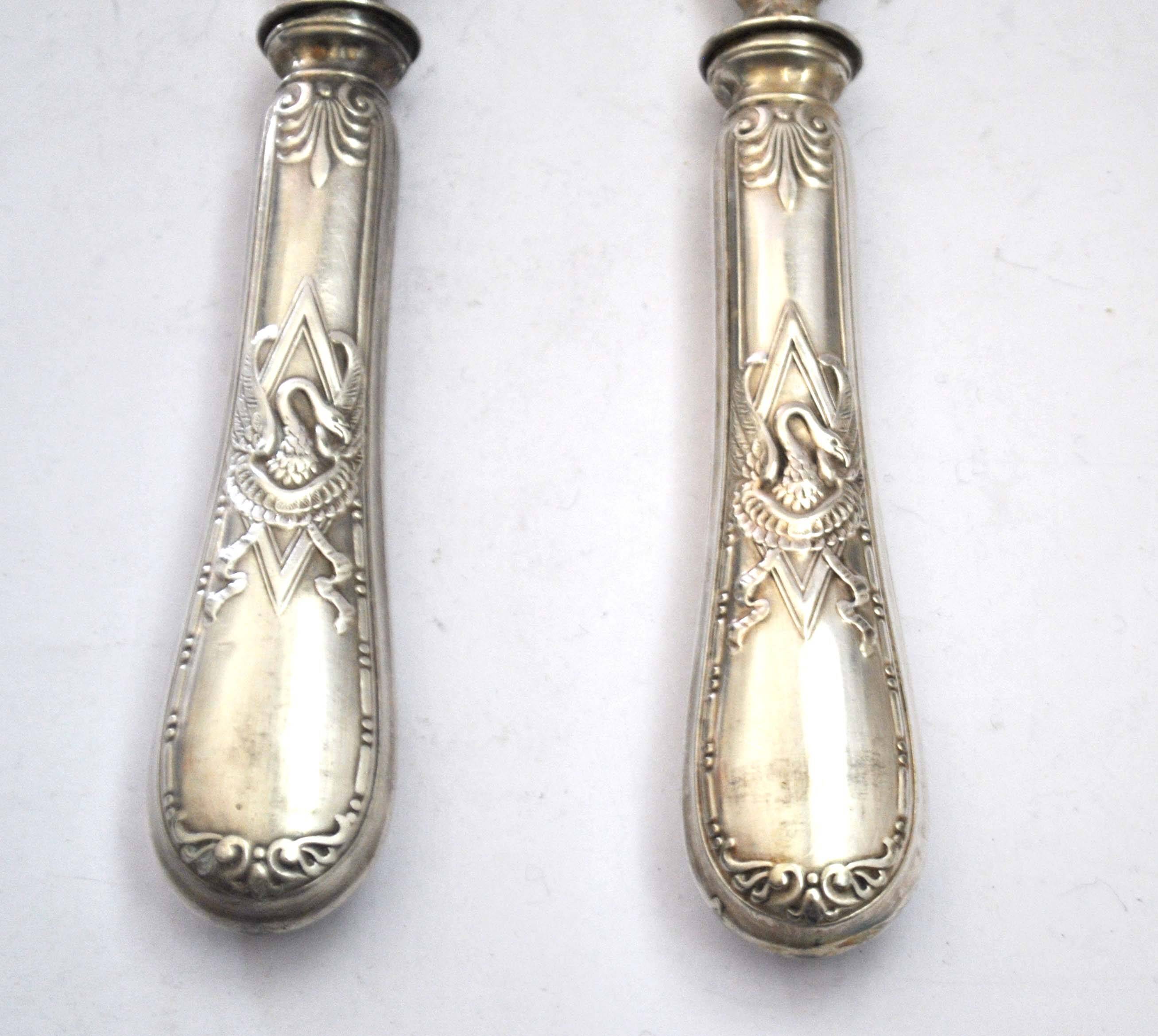 Empire salad server decorated with a swan and napoleon palmette, 19th century.