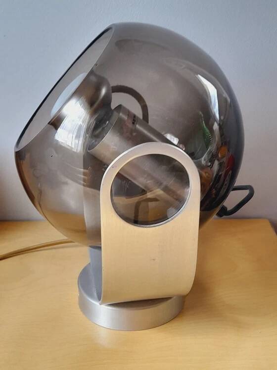Space age lamp in chrome metal and smoked glass from the 1970s.