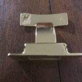 Golden wall coat rack