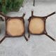 4 bentwood bistro chairs with a pattern on the seat