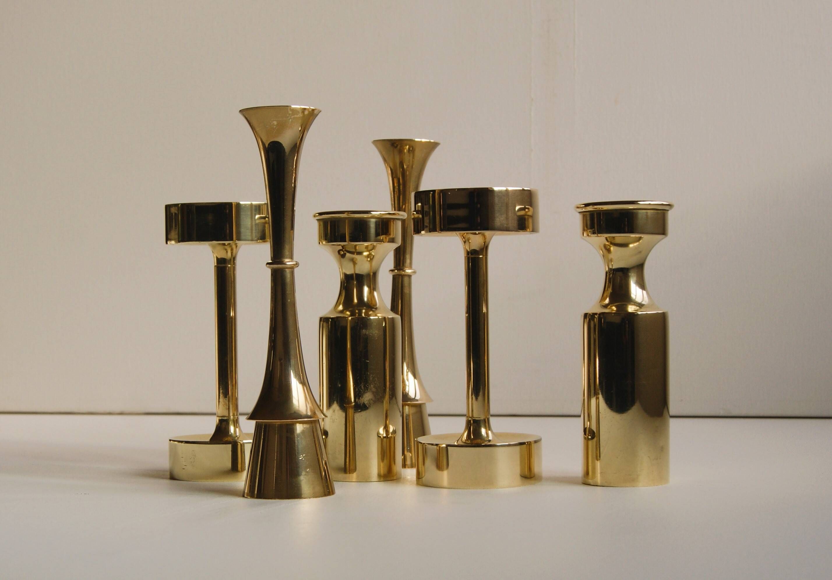 A set of six brass candle holder in mid-century modern design - Denmark 1970s.