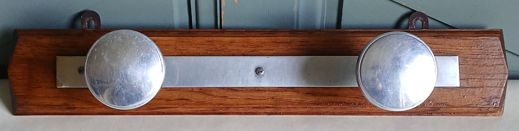 Coat rack with 2 hooks Art Deco in oak & aluminium, 1930