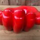 Empty pocket in the form of a red ceramic hand 60/70
