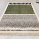 Handmade artisanal Moroccan Atlas rug made from natural wool.