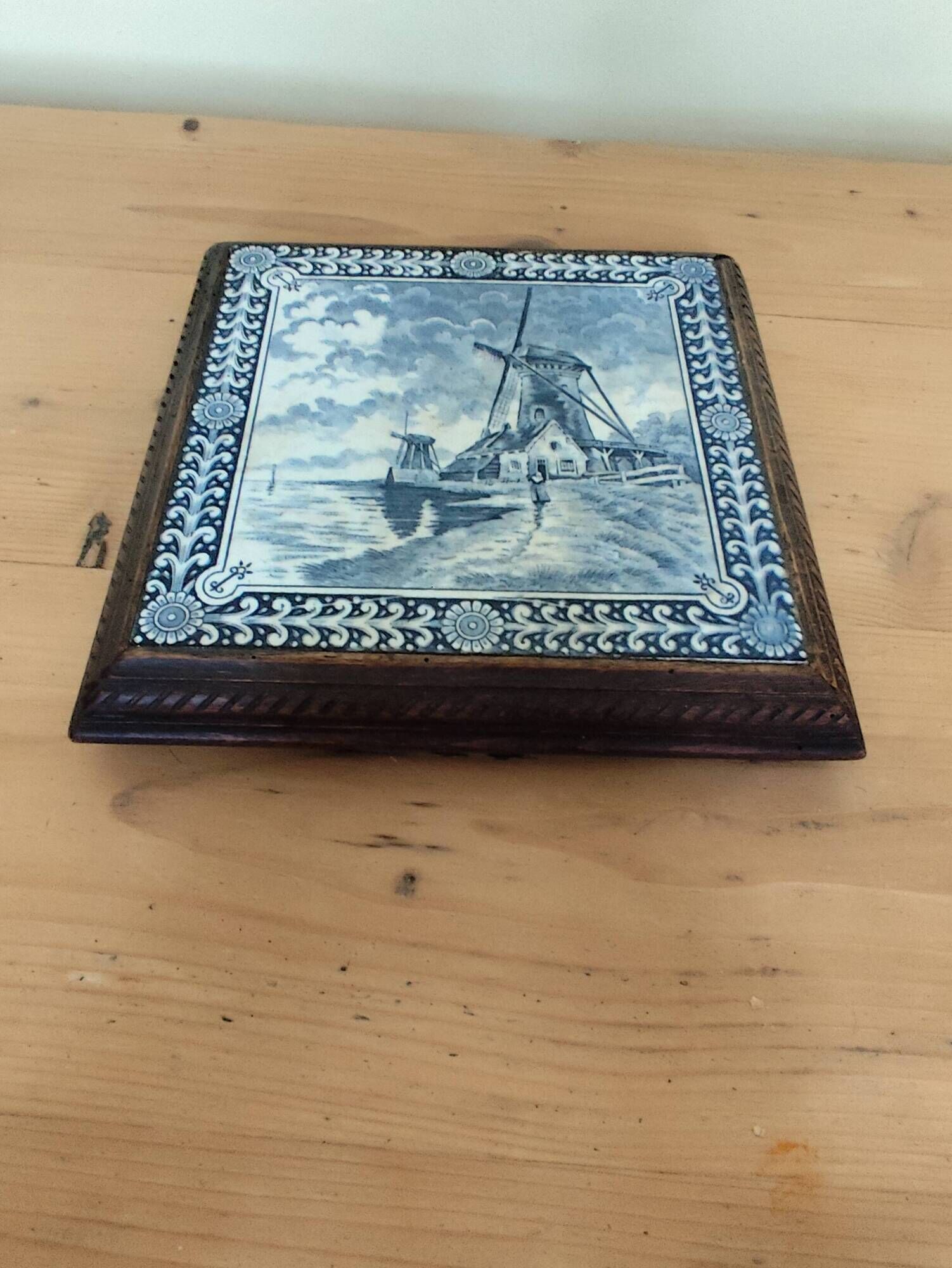 Ceramic tile trivet and wooden frame with Dutch windmill.