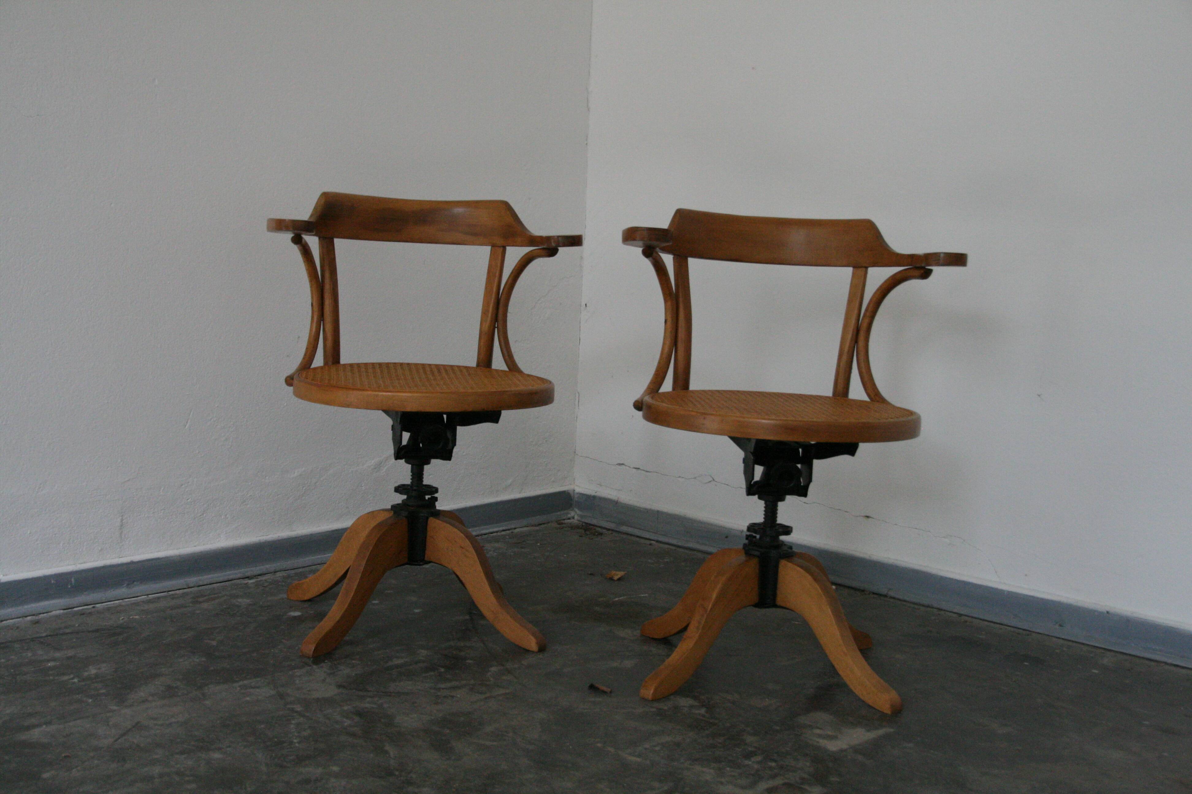 A pair of vintage bent wood svivel chairs by Salvaatore Leone Italy