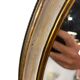 Miroir mural ovale baroque vintage à décor de noeud
