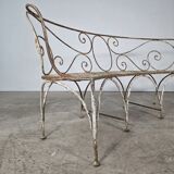 Beautiful curved garden bench from the late 19th century in iron.