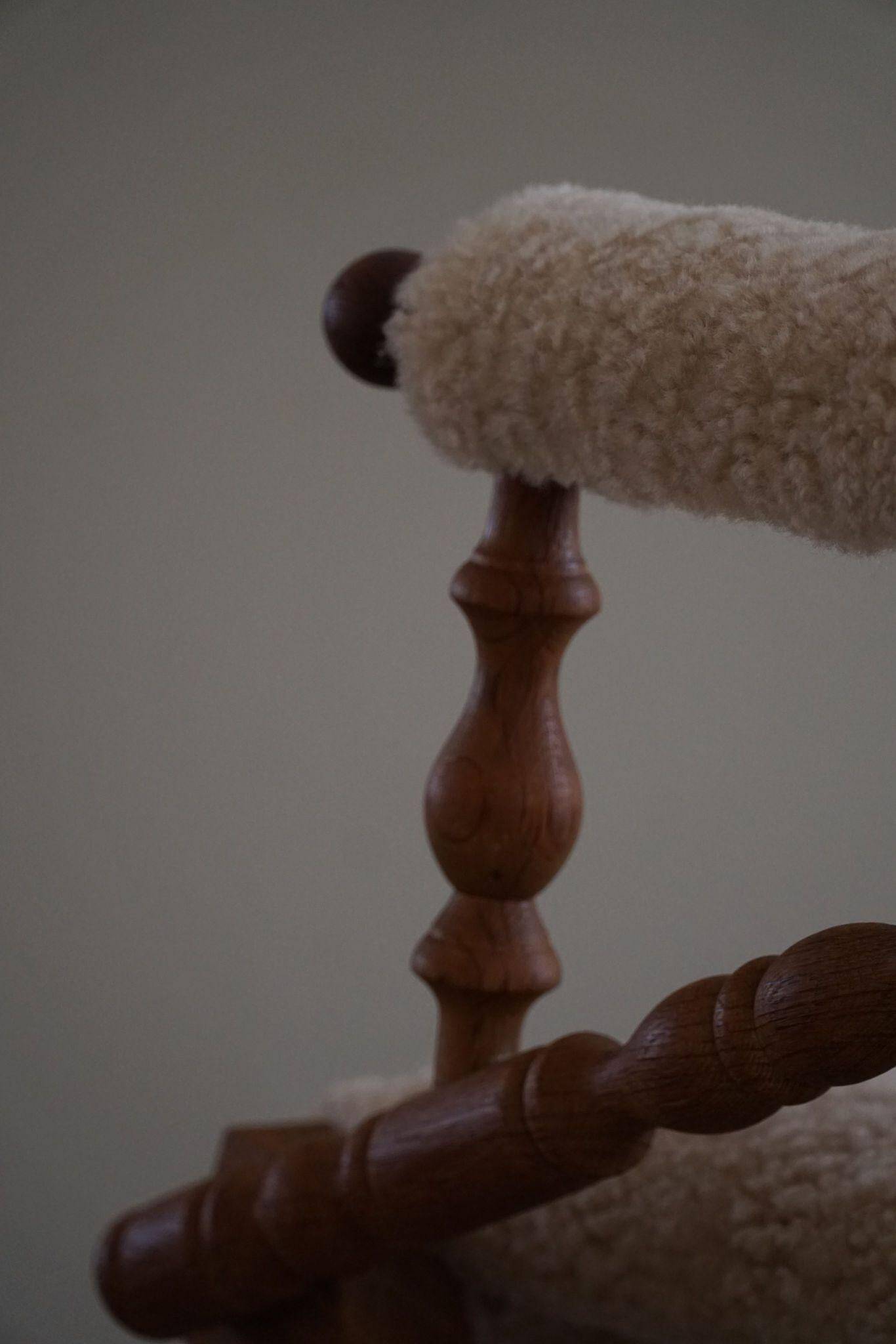 Pair of sculptural Danish modern rocking chairs in lambswool and oak, brutalist, 1950.