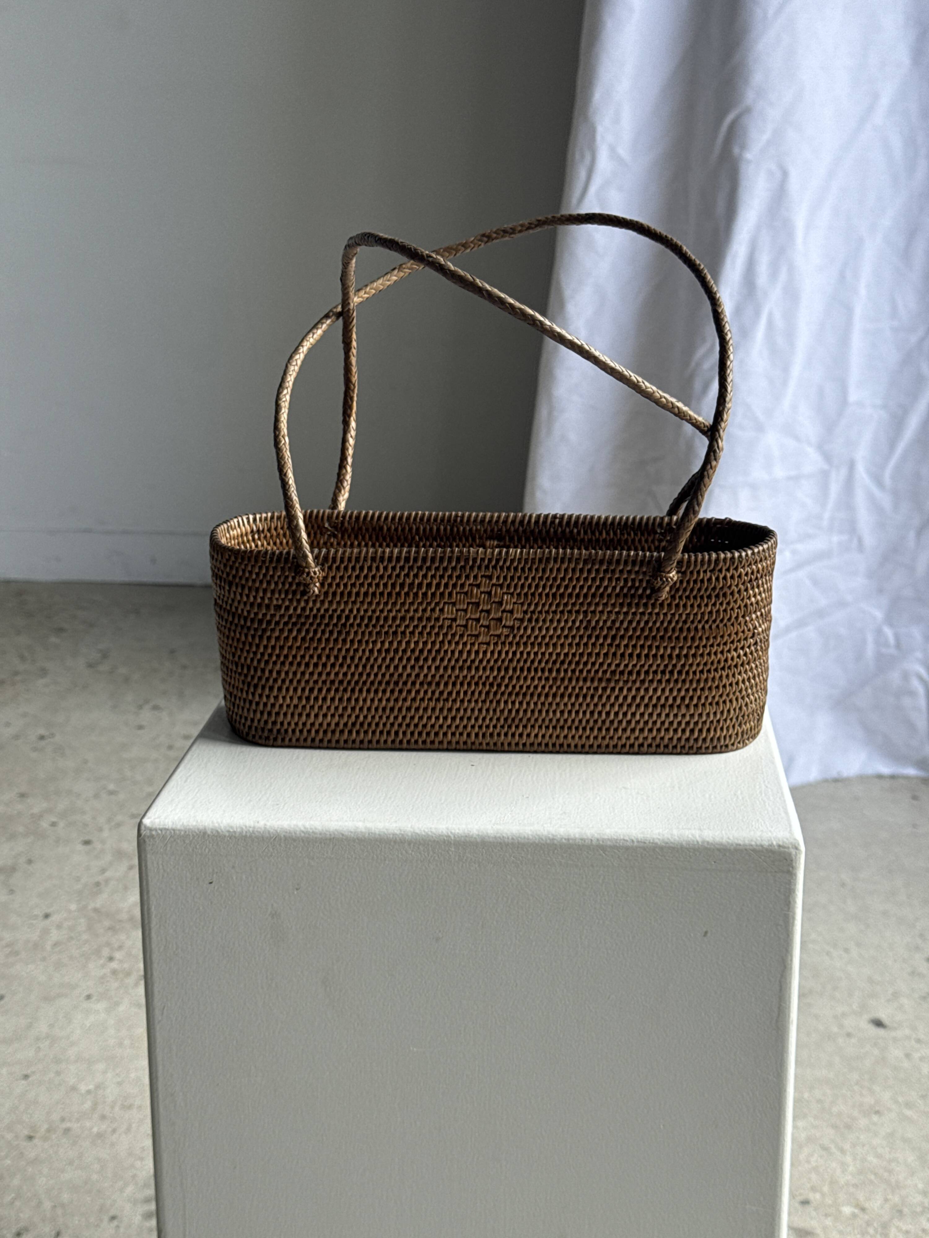 Small oval basket with long handles, traditional Indonesian L28xH10
