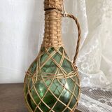 Bottle with rattan weaving