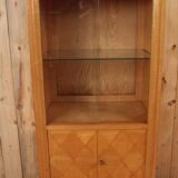 Art deco showcase in waved sycamore