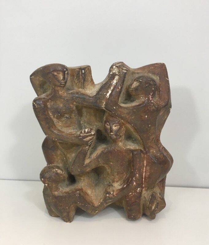 Plaster sculpture depicting a group of 3 figures