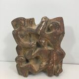 Plaster sculpture depicting a group of 3 figures