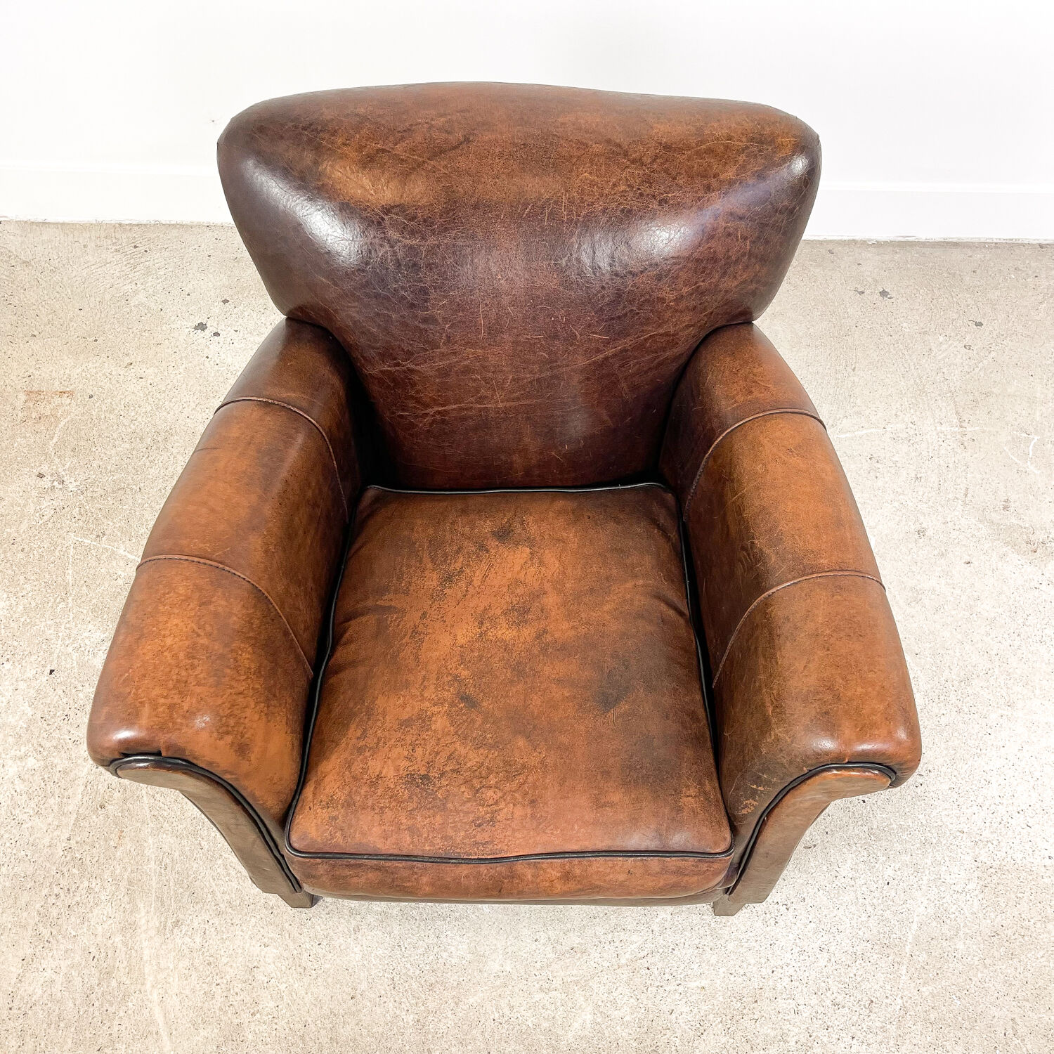 Fauteuil en cuir de mouton foncé fijnaart