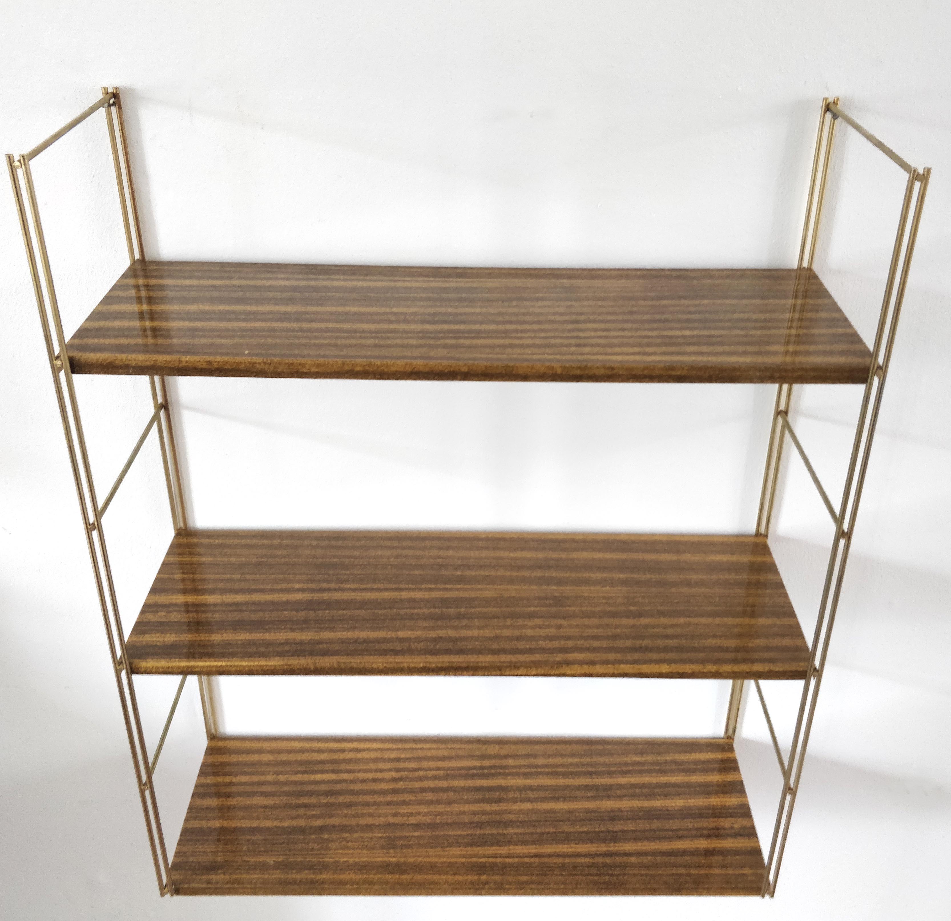 Brown metal string shelf and gilded studs 1960
