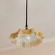 Electrified suspension with a frosted opaque glass disc shade.