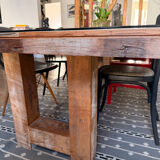 Magnificent wooden table with a glass top.