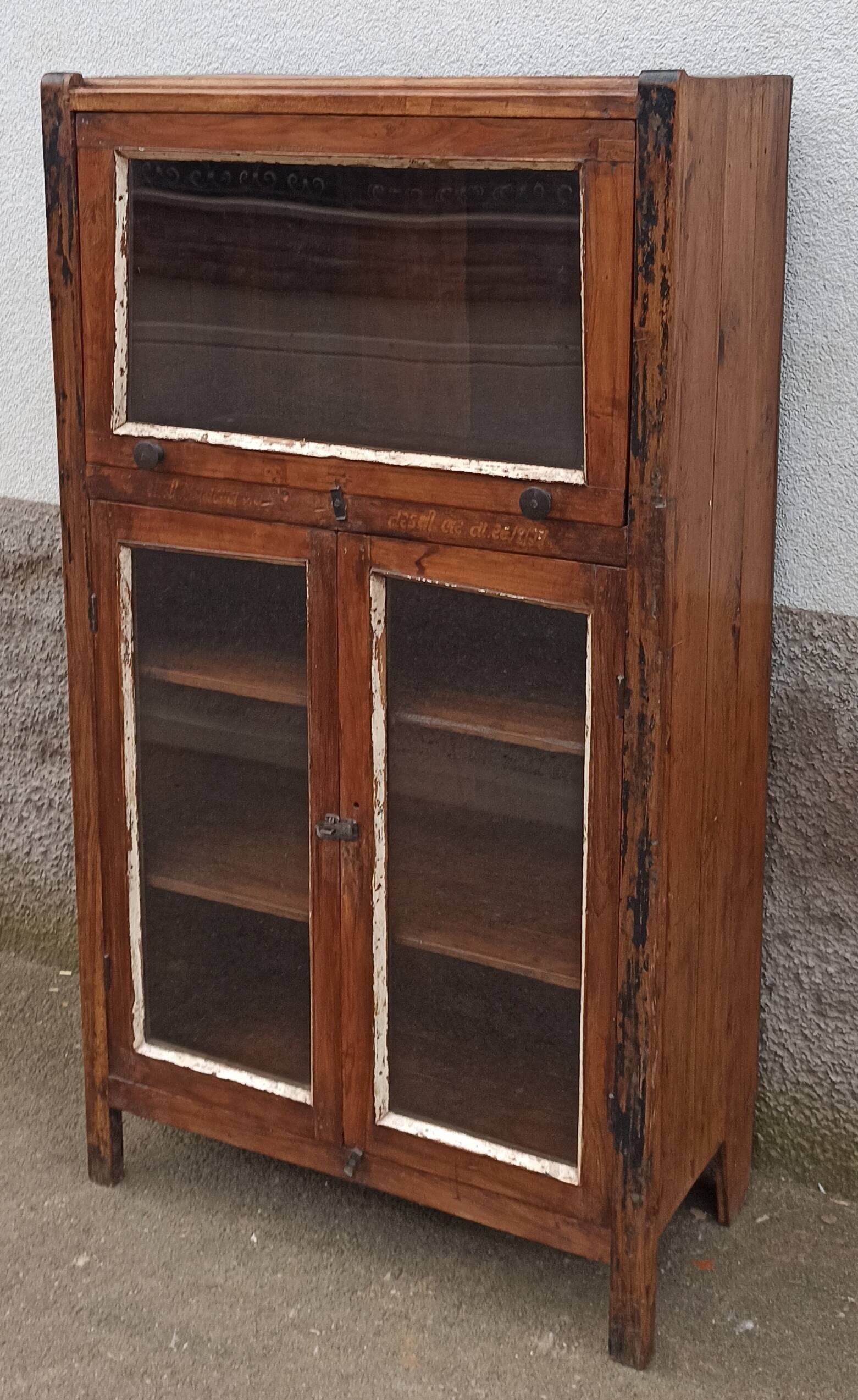 Small wooden glass cabinet with retractable door