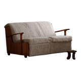 Modern Swedish two-seater independent sofa bed in pine and lambswool, 1950s.