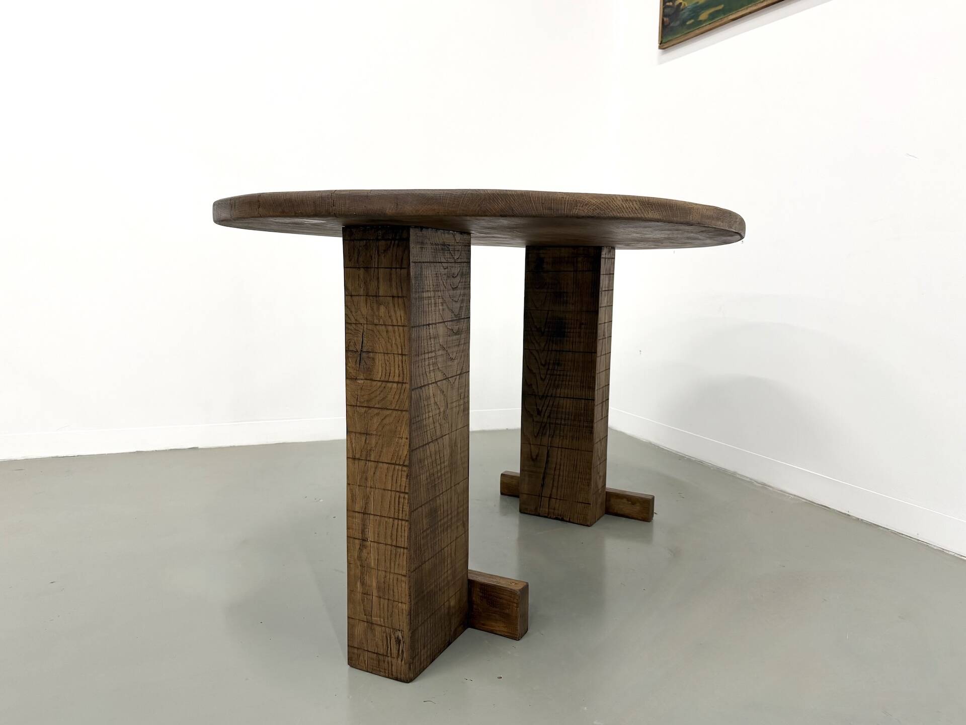 Oval table with T-shaped legs, solid oak, student woodworking project.