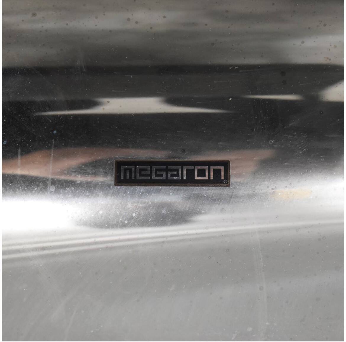 Fauteuil inox X Megaron Studio