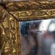 Antique mirror in gilded wood