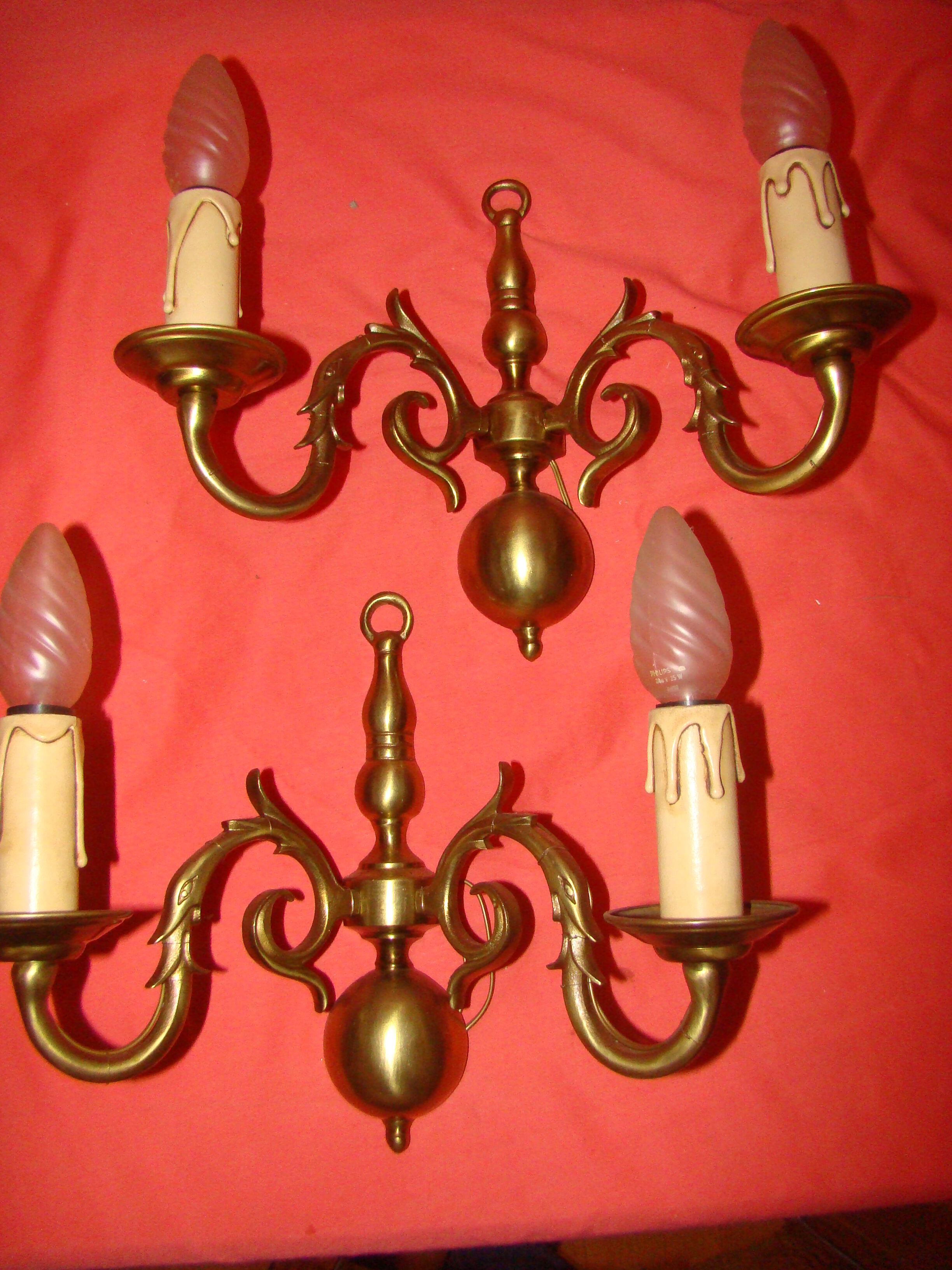 Pair of bronze wall lights with 2 arms in "Dutch" style.