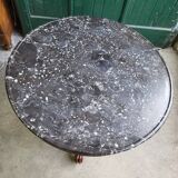 Round pedestal table with marble top and mahogany tripod from the 19th century