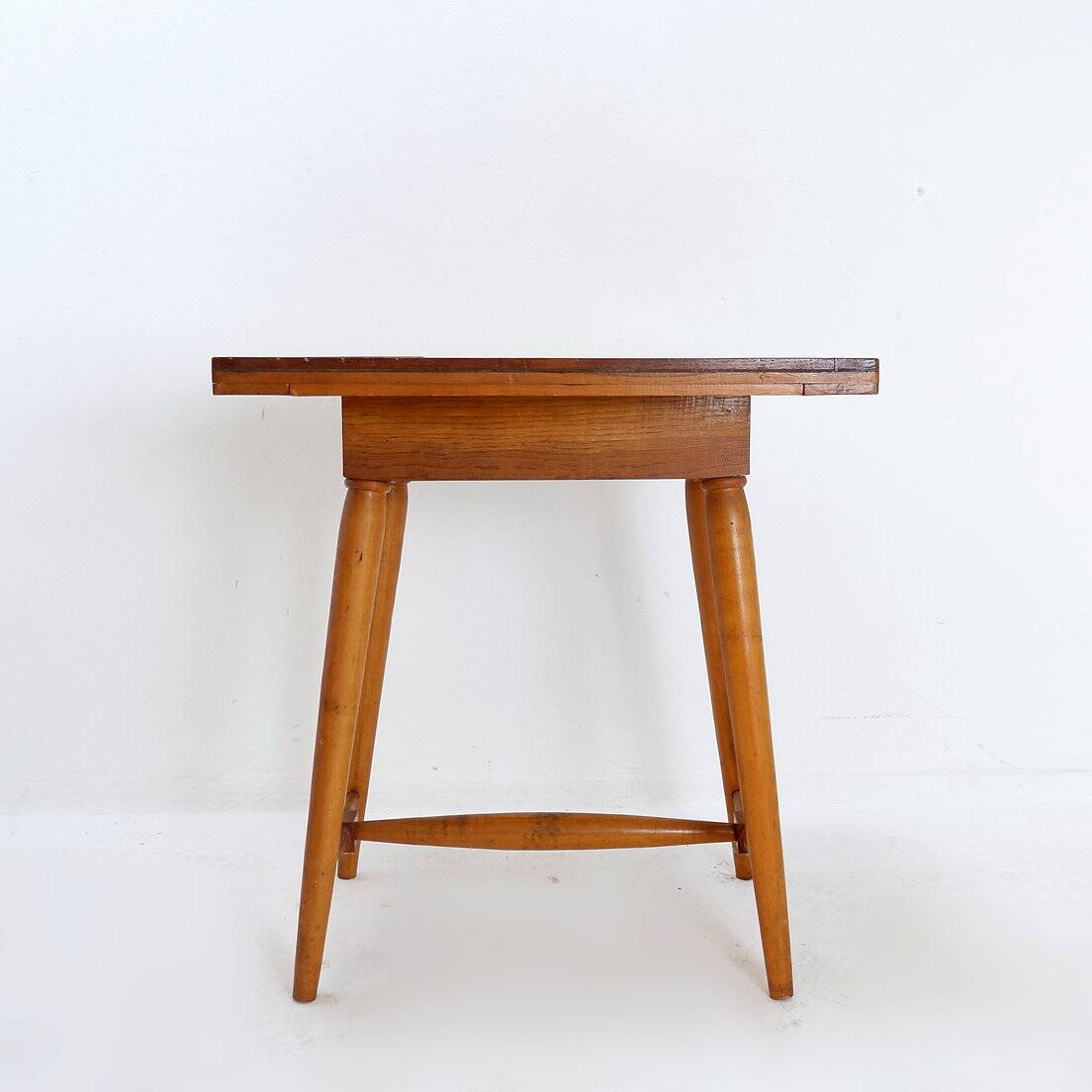 Vintage wooden side table with terracotta top