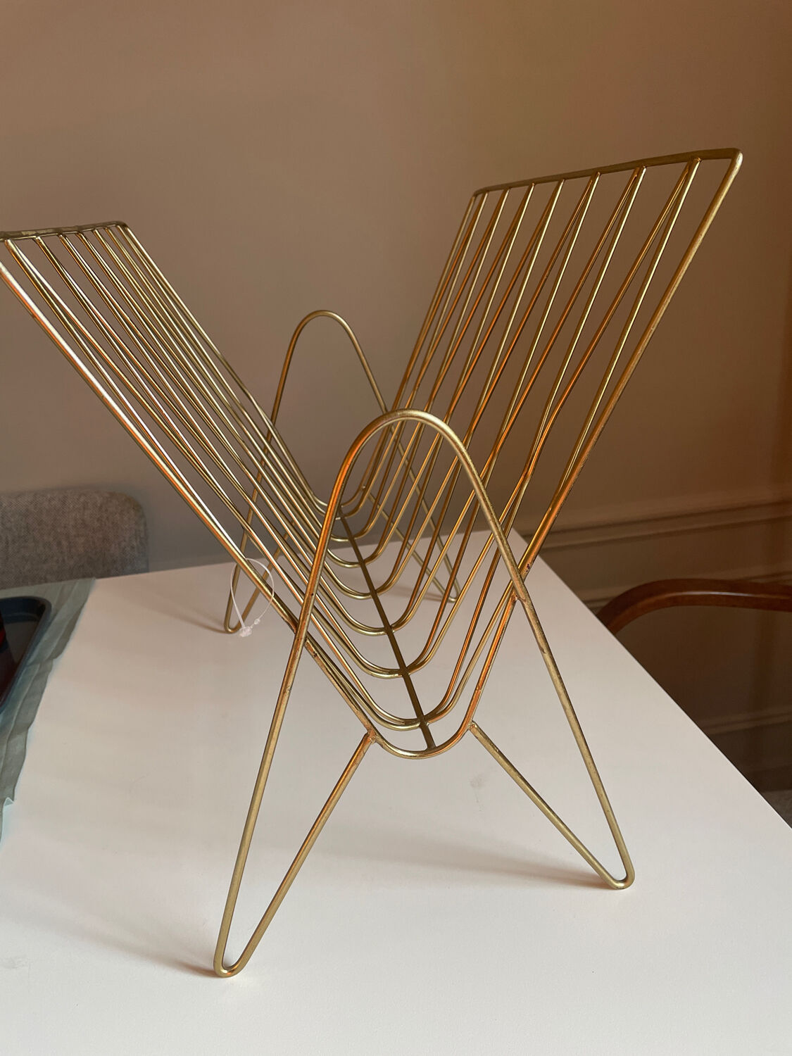 Golden brass magazine holder