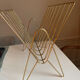 Golden brass magazine holder